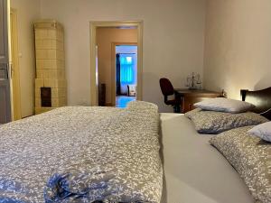 Ένα ή περισσότερα κρεβάτια σε δωμάτιο στο Luxury and historical apartment right in the center