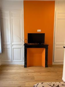 Μια τηλεόραση ή/και κέντρο ψυχαγωγίας στο Appartement Magnifique