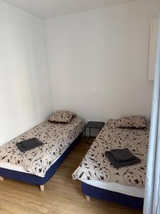 Ένα ή περισσότερα κρεβάτια σε δωμάτιο στο Appartement Magnifique