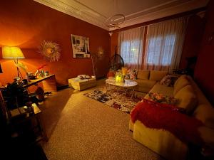 a living room with a couch and a table at Le belvédère in Casablanca