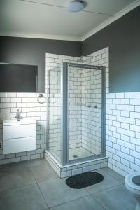 Ένα μπάνιο στο The Palms Guest House +44 φωτογραφίες