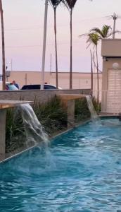 Bazén v ubytování Apartamento aconchegante nebo v jeho okolí