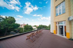 Balkón nebo terasa v ubytování Beehive Hotel