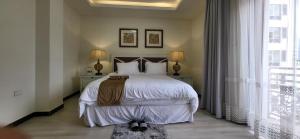 Ένα ή περισσότερα κρεβάτια σε δωμάτιο στο Two bedroom unit for rent Addis Ababa KMAN 302