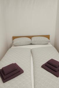 Postel nebo postele na pokoji v ubytování Apartman 1001