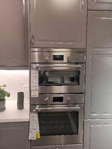two stainless steel ovens in a kitchen at hotel apartments cairo downtown in Cairo