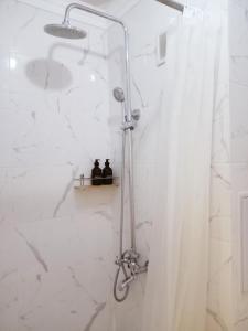 Koupelna v ubytování Уютная квартира недалеко от центра города + 18 fotografií