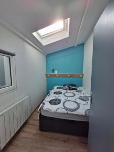 Ένα ή περισσότερα κρεβάτια σε δωμάτιο στο Maison Les 4 As, classée 3 étoiles, à 800 mètres de la mer, 6 personnes +24 φωτογραφίες