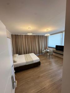 Postel nebo postele na pokoji v ubytování Air B&B Hotel