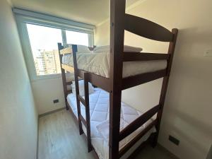 Postel nebo postele na pokoji v ubytování Ñuñoa I Cercano a Metro con Estacionamiento