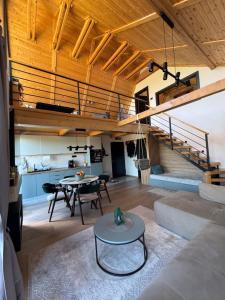 a living room with a couch and a table at Pine Chalet Vodice in Vodice