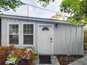 a white garage with a white door at The Perfect One Night Stay in Jacksonville
