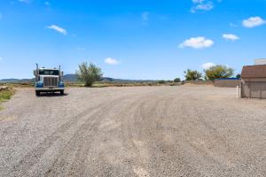 a truck parked on the side of a dirt road at Americas Best Value Inn Prescott Valley in Prescott Valley