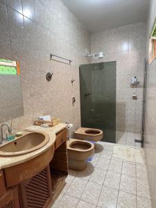 Ένα μπάνιο στο Hotel pousada Janaúba +93 φωτογραφίες
