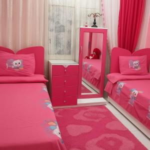 Ένα ή περισσότερα κρεβάτια σε δωμάτιο στο Marhaba