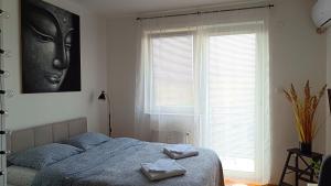 Ένα ή περισσότερα κρεβάτια σε δωμάτιο στο Terminal