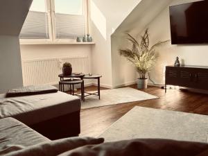 Posezení v ubytování CityStay Wolfsburg - Beetle