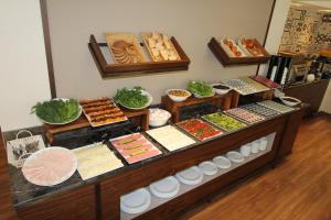 a buffet with many different types of food on display at Pisa Hotel in Istanbul