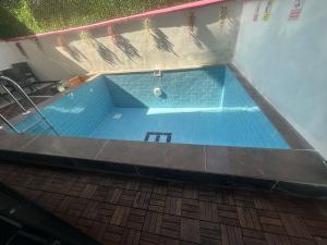 an overhead view of a swimming pool in a building at Vibe Suit in Eskisehir