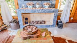 Fotografie z fotogalerie ubytování Chale em Santa Teresa com vista Lago e Lareira v destinaci Santa Teresa