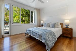Katil atau katil-katil dalam bilik di Byron Bay Haven +26 gambar