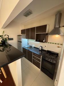 Køkken eller tekøkken på GIU Departamento Temporario + 3 billeder