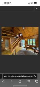 a picture of a room in a log cabin at Cabanas Gael in Mar de las Pampas