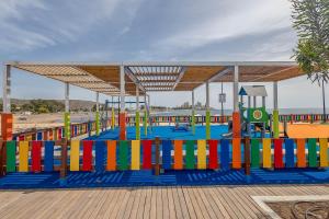 a playground with colorful dividers in a playground at Apartamentos L O L A Arguineguin in Arguineguín