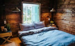 Postel nebo postele na pokoji v ubytování Dalat Memories Home + 5 fotografií