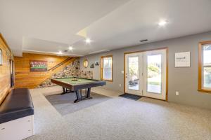 a game room with a pool table in it at Live Large on Saddle Lake! Family Home with Dock in Grand Junction