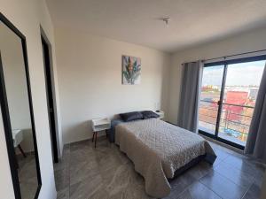 Postel nebo postele na pokoji v ubytování Apartamento Familiar Céntrico