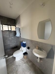 Koupelna v ubytování Apartamento Familiar Céntrico + 13 fotografií