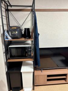 TV a/nebo společenská místnost v ubytování T301 Townhouse with a view of Sakurayama Hachimangu Stay 6 people