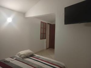 TV a/nebo společenská místnost v ubytování Casa Nomada 28 Cancun