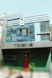 a building with a guest lan sign on it at Spot On V GUST IN in Tenāli