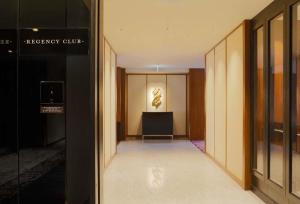 an empty hallway with a desk in a building at Hyatt Regency Yokohama in Yokohama