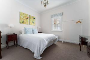 Ένα ή περισσότερα κρεβάτια σε δωμάτιο στο Rosevilla Retreat - Beautiful Farm Getaway