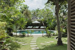 a pool in the backyard of a villa at Bodhi Bingin in Uluwatu
