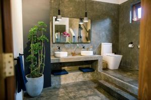 Ένα μπάνιο στο Makahiya Fitness Boutique Hotel