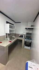Una cocina o cocineta en Windmill Bliss