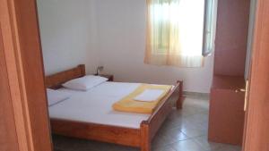 Postel nebo postele na pokoji v ubytování Apartments Matulic
