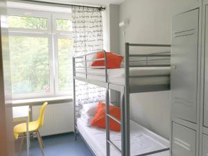 Posteľ alebo postele v izbe v ubytovaní Cloud Hostel
