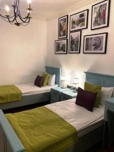 Ένα ή περισσότερα κρεβάτια σε δωμάτιο στο Aldemar Apart Hotel