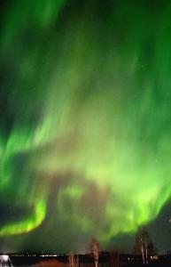 an image of the northern lights in the sky at Vasko Luxurious Suites, Firefox in Rovaniemi