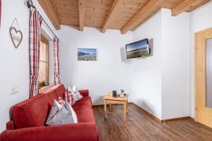 TV a/nebo společenská místnost v ubytování Larchergut