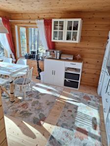 Kuchyň nebo kuchyňský kout v ubytování Cabin, North Savo, Rautavaara + 3 fotografie
