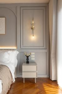 Ένα ή περισσότερα κρεβάτια σε δωμάτιο στο Penthouse The Olaf at Chiang Mai's Old Town Suandok Gate I Entire Villa Booking I 4 Bedrooms I Daily Housekeeping +125 φωτογραφίες