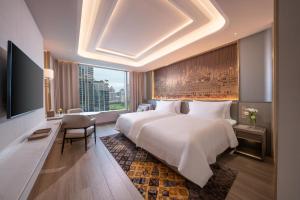 Katil atau katil-katil dalam bilik di Grande Centre Point Prestige Bangkok +35 gambar