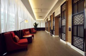 Posezení v ubytování Estadia Hotel