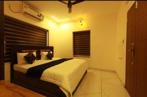 เตียงในห้องที่ SR Meridian